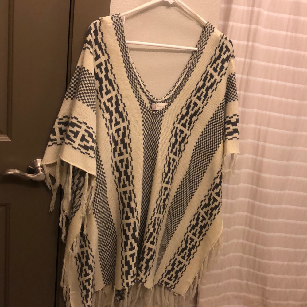 Grey and white poncho